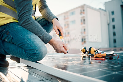 Buy stock photo Solar panel, city and construction worker hands with tools for renewable energy and electricity. Community innovation, roof work and engineering employ install eco friendly and sustainability product