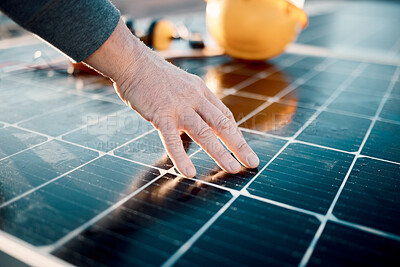 Buy stock photo Hands, engineer and solar panel in construction for renewable energy, electricity or technology. Hand of electrician or technician feeling heated plates for quality, sun or testing power on building