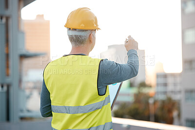 Buy stock photo Building, construction and senior man with vision, planning and thinking of architecture design in city. Engineering, urban development and handyman, maintenance worker and contractor writing ideas