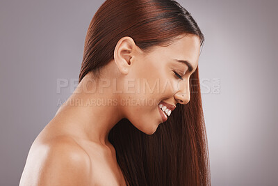Buy stock photo Salon, beauty and hair with a model black woman in studio on a gray background for natural treatment. Aesthetic, face and haircare with an attractive young female posing to promote keratin benefits