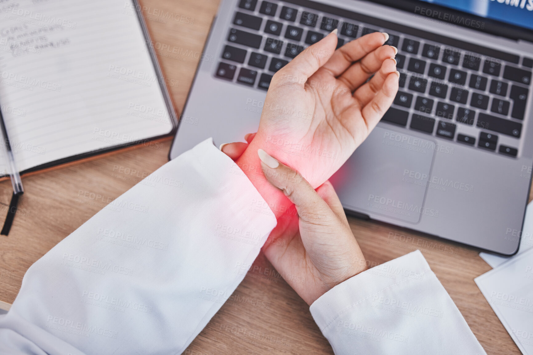 Buy stock photo Hands, woman and wrist with joint pain, laptop at desk from typing in office for public relations manager. PR expert, computer and burnout with red overlay for arthritis, carpal tunnel and planning