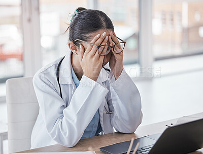 Buy stock photo Burnout, stress or doctor woman on laptop with headache from depression, mental health or anxiety medical review. Tired, pain or sad nurse frustrated, angry or depressed for medicine report in office