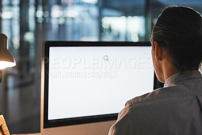 Buy stock photo Man, computer and green screen on mockup at night for advertising, marketing or branding at the office. Male employee working on PC or desktop with mock up display in research, advertisement or app