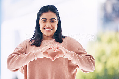 Buy stock photo Heart hands, portrait and happy woman for self care, cardiology wellness and gen z support for women health. Face of a young Indian person with love emoji, sign or gesture for like, vote and smile