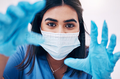 Buy stock photo Woman, doctor and hands with face mask for healthcare, exam or busy with surgery at the hospital. Female medical expert, surgeon or nurse with latex gloves ready for checkup or examination at clinic