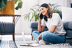Woman, phone call and laptop with notebook in the living room by sofa in remote work or studying at home. Happy female freelancer in conversation or discussion on smartphone and computer on the floor