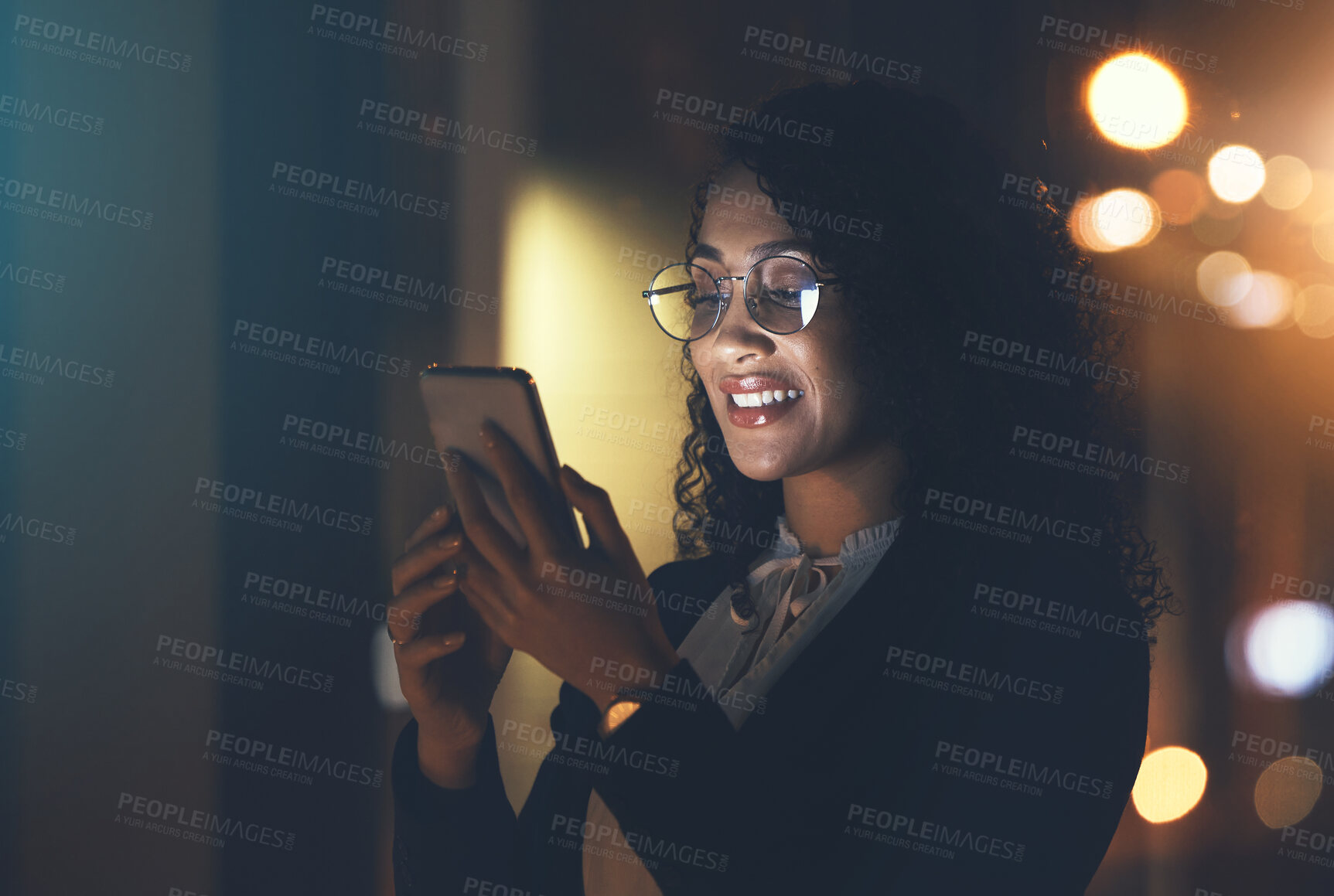 Buy stock photo Night, business and woman with smartphone, typing and smile for achievement, new project and social media. Late, female and girl with cellphone, connection and overtime with device and online reading