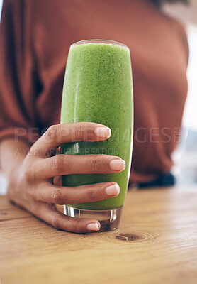 Buy stock photo Hand, glass and smoothie with a black woman holding a health beverage for a weight loss diet or nutrition. Wellness, detox or drink with a healthy female enjoying a fresh fruit and mint juice
