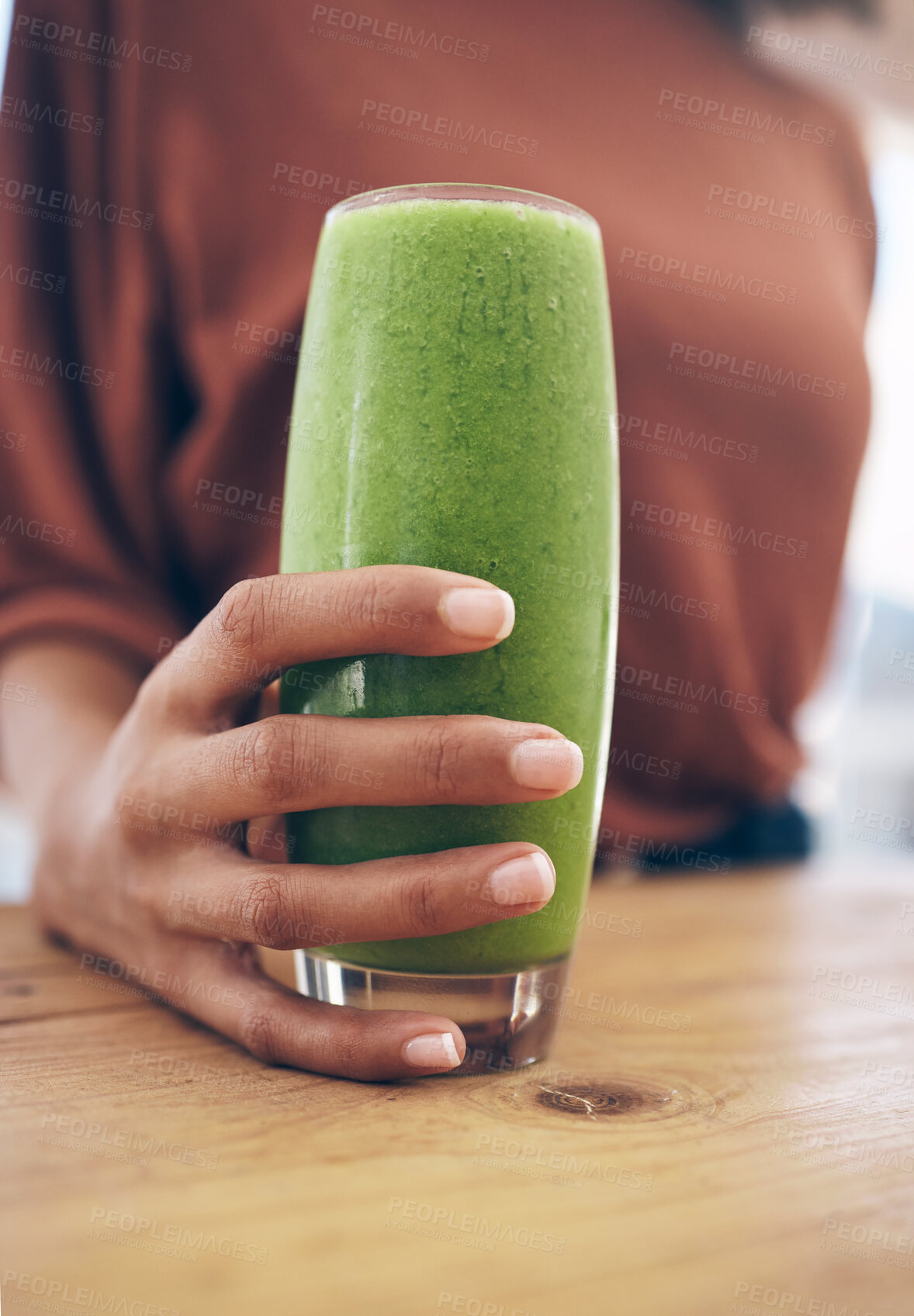 Buy stock photo Hand, glass and smoothie with a black woman holding a health beverage for a weight loss diet or nutrition. Wellness, detox or drink with a healthy female enjoying a fresh fruit and mint juice