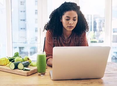 Buy stock photo Relax, smoothie and health with black woman and laptop for blog research, salad and vegetables. Nutritionist, diet and food with girl by kitchen counter for cooking, technology and learning at home