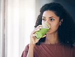 Healthy, diet and woman drinking a smoothie for weight loss, energy and breakfast while thinking. Food, health and girl with a juice cocktail for nutrition idea, green detox and vegan lifestyle
