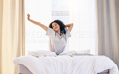 Buy stock photo Morning stretching, black woman and wake up in home bedroom after sleeping or resting. Relax, peace and comfort of happy female stretch after sleep feeling fresh, awake and well rested in house.