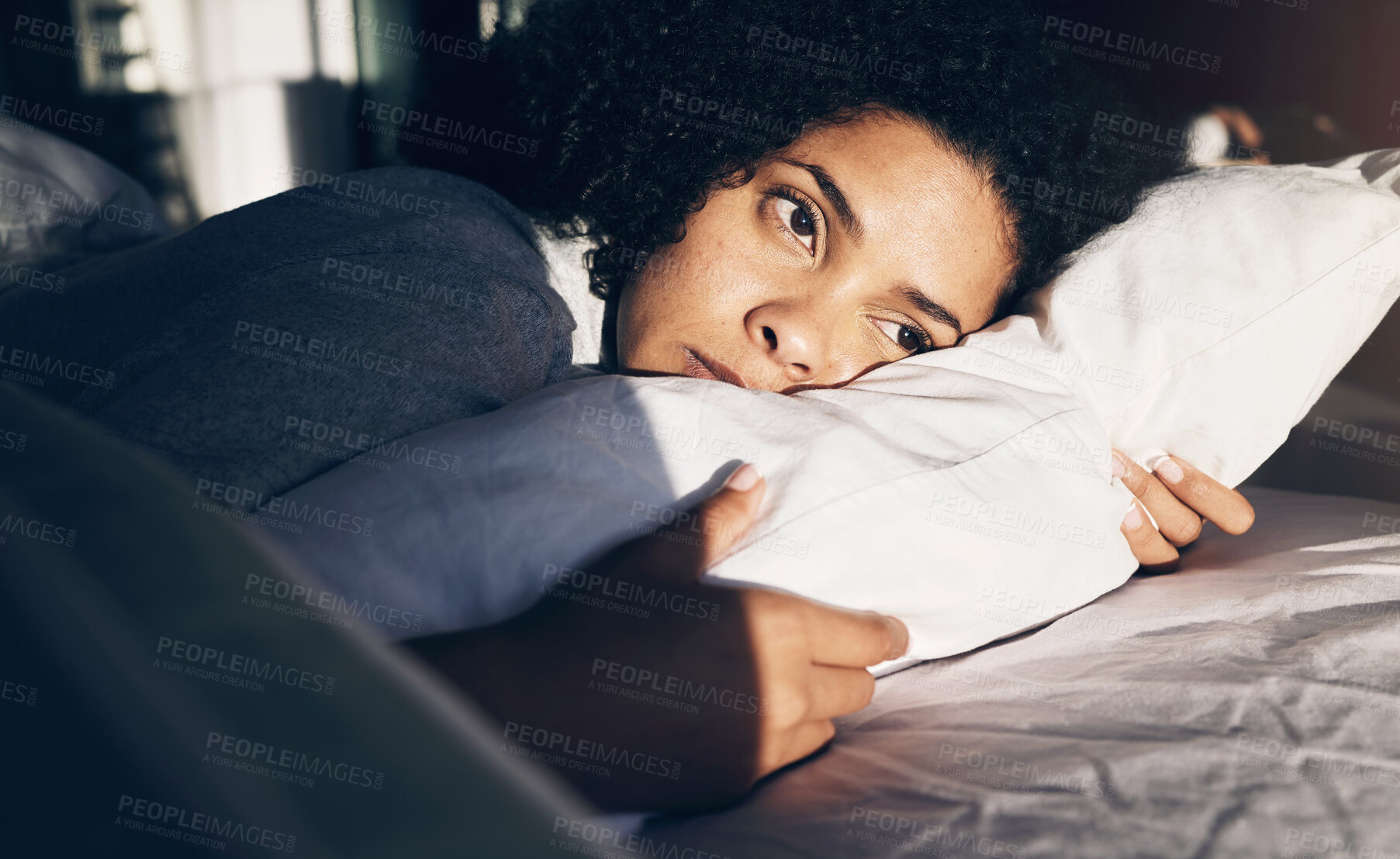 Buy stock photo Anxiety, depression and sad woman tired in bed with insomnia, thinking and trying to sleep while sick. Morning, sunrise and depressed girl with stress, mental health problem and fatigue in bedroom