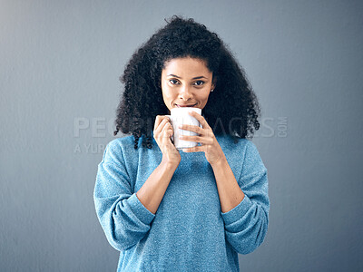Buy stock photo Coffee, tea and portrait of black woman drinking an espresso in a cup isolated in a studio gray background. Morning, relax and female with hot beverage with caffeine for energy and feeling happy