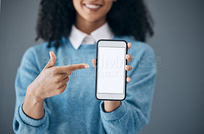 Buy stock photo Mockup screen, phone or black woman pointing hand at digital marketing, branding or advertising content. Startup, web or girl in studio with smartphone for product space, internet or social media 