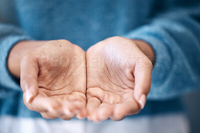 Buy stock photo Hands open, charity and support with a woman begging for help in studio closeup for humanity to share. Community, poverty and donation with female palms asking for aid, compassion or kindness 