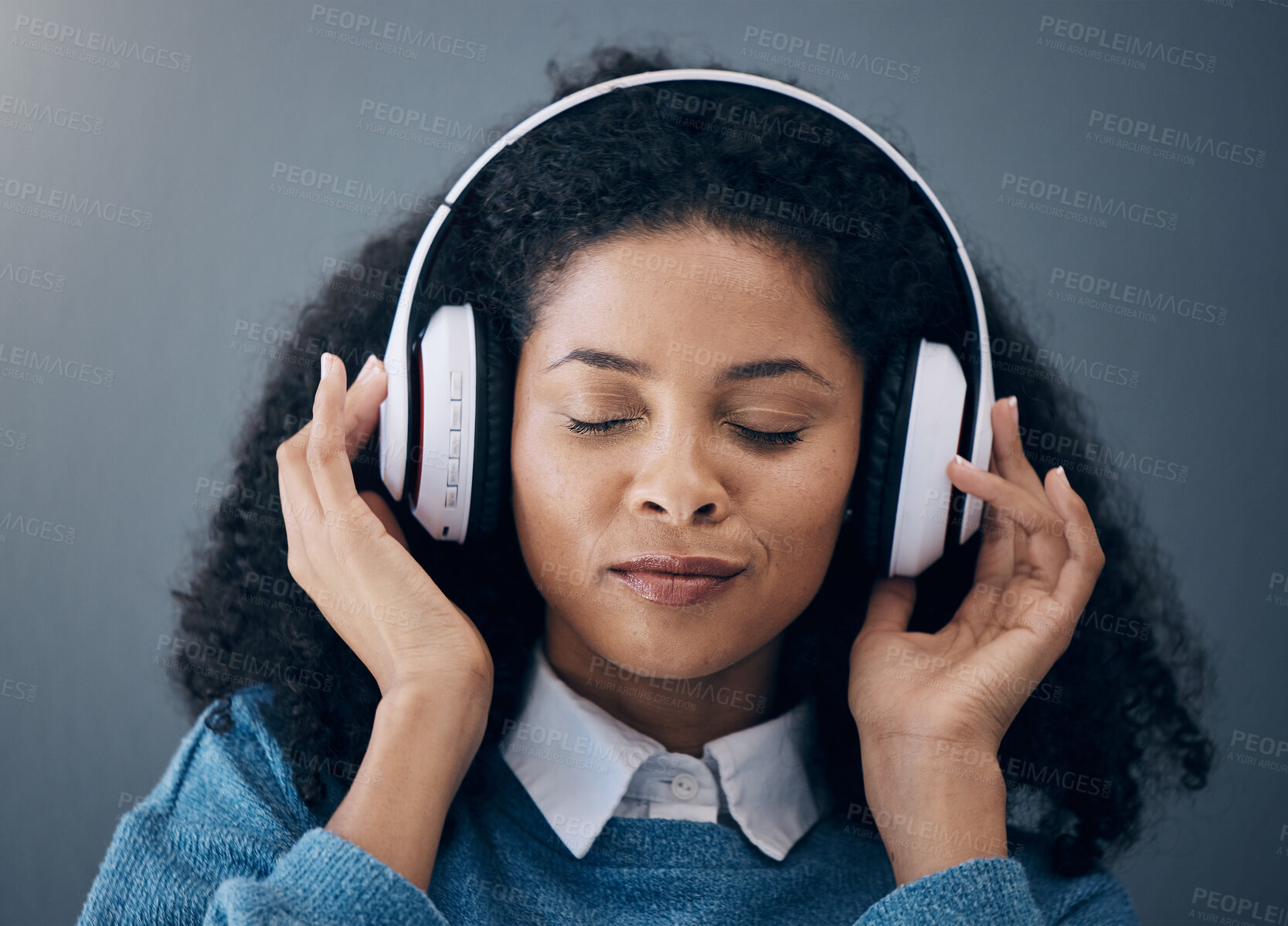 Buy stock photo Headphones, music and face of black woman relax with wall background listening to audio, radio and song. Freedom, calm and happy girl in studio for peace, mindset and streaming wellness podcast