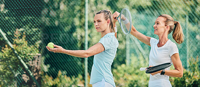 Buy stock photo Tennis training, sport and women together on outdoor turf, instructor or coach with fitness, motivation and help. Exercise, sports lesson and athlete workout, teaching and learning skill on court