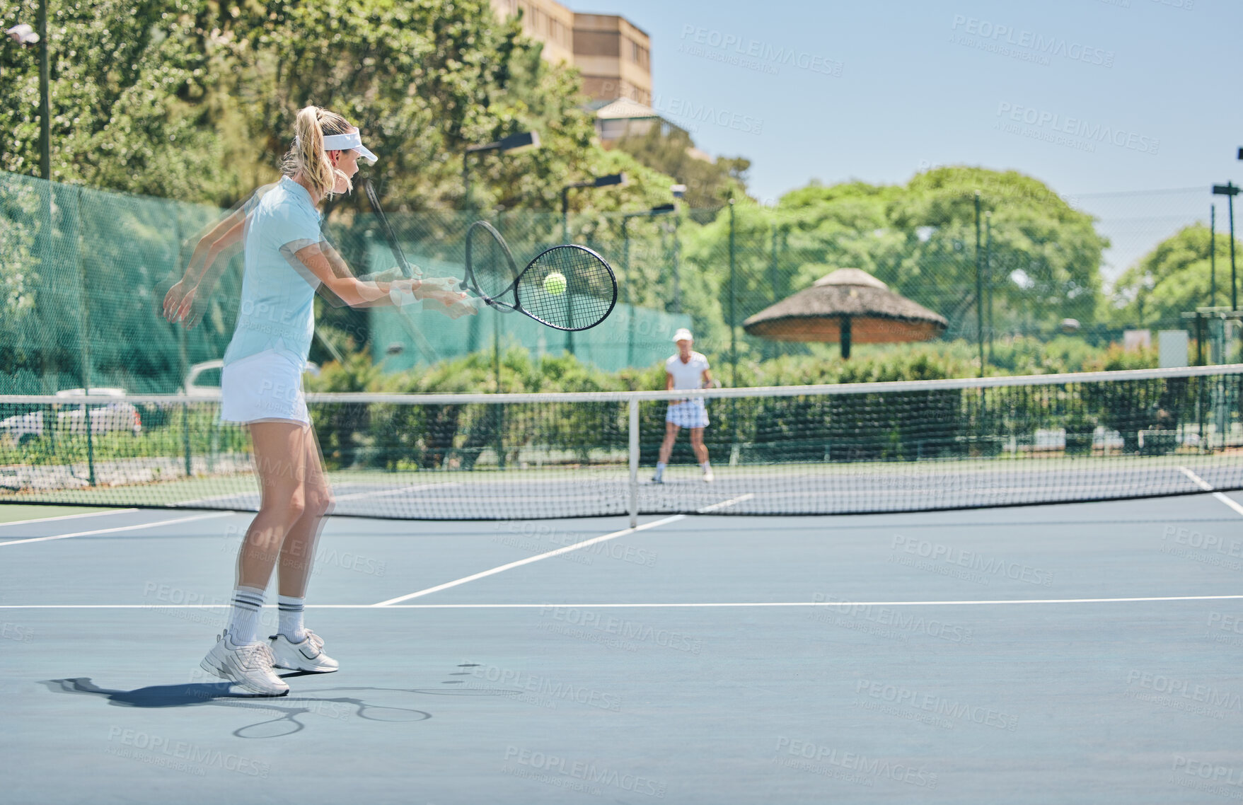 Buy stock photo Tennis court, sports match and women outdoor for fitness, exercise and training for competition. Athlete person hit ball at club for game performance for health and wellness with summer cardio action