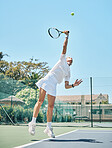 Tennis serve, sports and woman jump on outdoor court, fitness motivation and competition with athlete training for game. Workout, healthy and player on turf, active with sport and exercise action