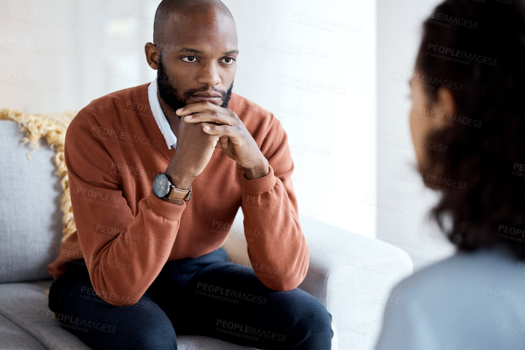 Buy stock photo Mental health, depression and black man with a therapist for grief, depression or anxiety counseling. Psychology, sad and professional psychologist helping a African male patient in a clinic session.