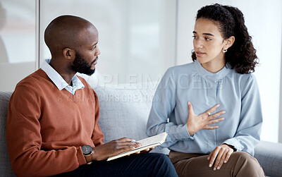 Buy stock photo Mental health, therapy and counselling consultation with woman patient and psychologist. Person talking to man therapist writing notes about psychology, anxiety and depression or stress for help 
