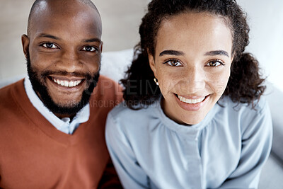 Buy stock photo Happy, smile and portrait of an interracial couple on the sofa for happiness, relax and together. Love, care and above face of a black man and woman on living room couch in a marriage for relaxing
