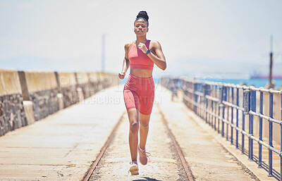 Buy stock photo Black woman, running and fitness with runner outdoor, athlete with cardio and speed with run on bridge. Runner, active and sports with workout, exercise and training for marathon or race with mockup