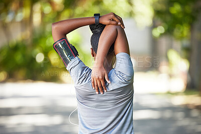 Buy stock photo Black woman, fitness and stretching arms for running, cardio exercise or workout preparation in nature. African American female in warm up arm stretch behind back getting ready for run or training