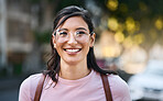 Mockup, portrait and woman in a city for travel, holiday and vacation on blurred background. Face, girl and student traveller relax downtown for fun, break and explore urban street, smile and happy