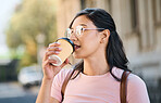 Mockup, coffee and woman in a city for travel, holiday and vacation on blurred background. Tea, girl and student traveller relax downtown for fun, break and exploring urban street, calm and content