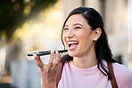 Phone, happy and woman with phone call in a city, smile and excited for speaker conversation on building background. Smartphone, girl and voice to text while laughing, talking and  social network app