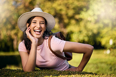 Buy stock photo Woman, portrait and park activity of a young person happy about nature, travel and freedom. Happiness, smile and laughing female with blurred background in a garden feeling relax and summer fun
