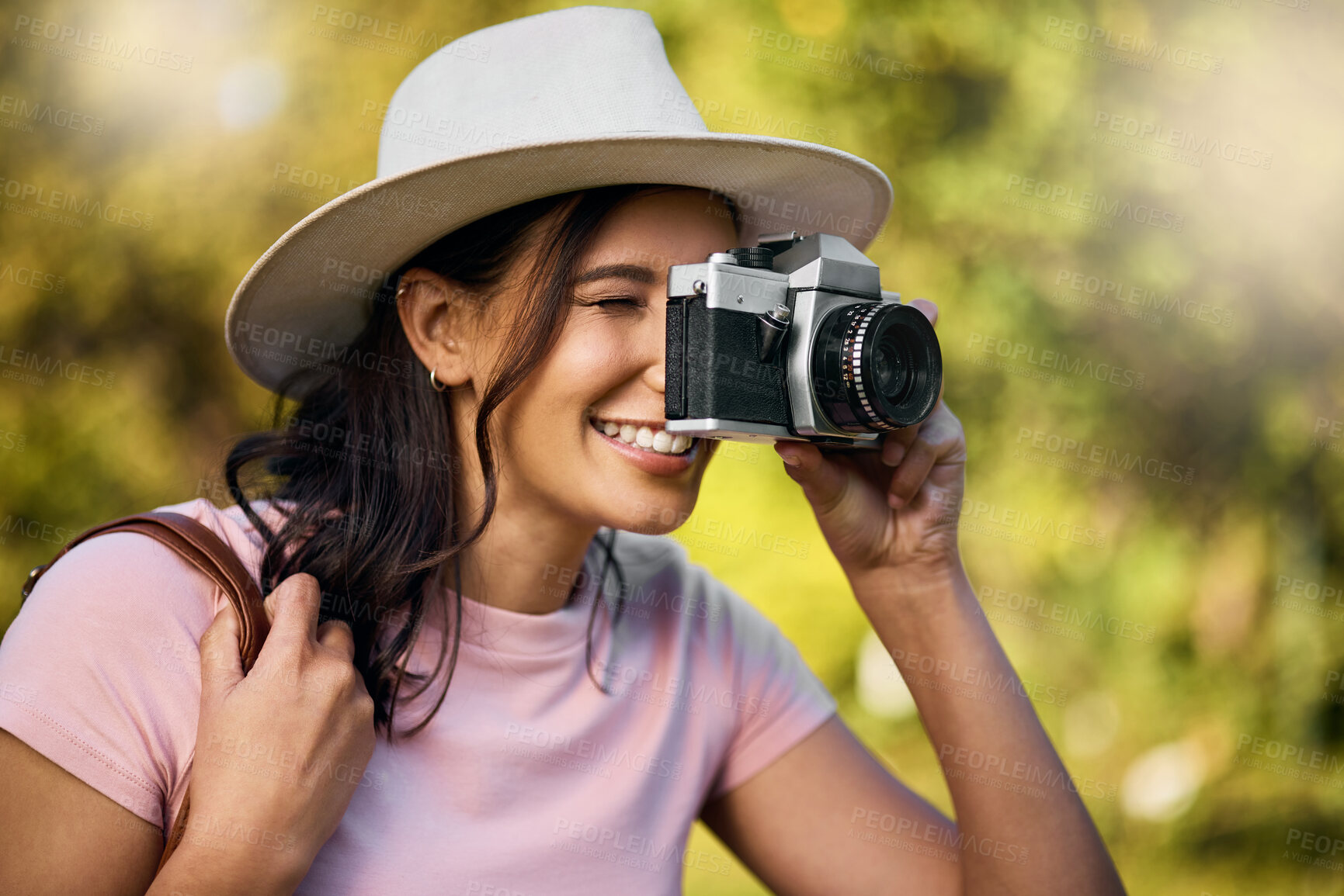 Buy stock photo Photography, smile and woman with a camera in nature during travel in Singapore. Vacation, tourism and professional ecology photographer in a botanical garden to capture the natural environment