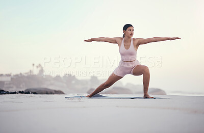 Buy stock photo Yoga, warrior pose and woman on the beach doing a meditation for zen in nature. Sea, sand and young person with mindfulness workout outdoor to calm and relax chakra energy with pilates by ocean