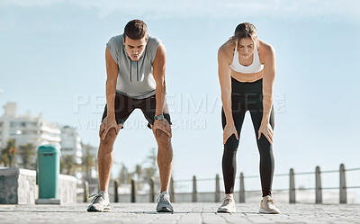 Buy stock photo Fitness, exercise and tired couple with blue sky to rest for health and wellness outdoor. Man and woman for city workout, cardio performance and healthy lifestyle for body fatigue, breathe and energy