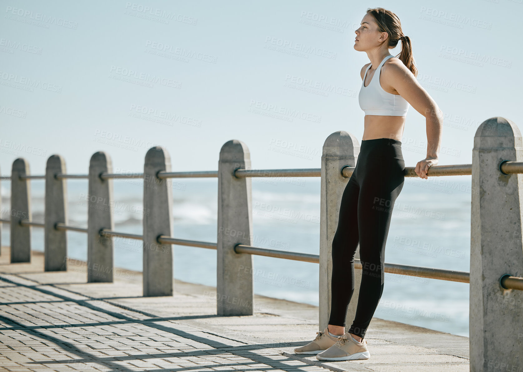 Buy stock photo Fitness, runner and woman relax at beach after running, cardio workout and break from exercise with fresh air. Calm, zen and peace with thinking, health and wellness with mockup and lifestyle outdoor