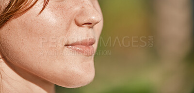 Buy stock photo Mouth, closeup and woman on mockup outdoors on blurred background for advertising and space. Half, face and girl relax on copy space, content and peaceful, natural and calm with product placement
