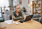 Senior woman, online debt and computer of an elderly person planning retirement savings. Digital budget, paperwork and laptop of an old female reading financial, banking and insurance data or bills