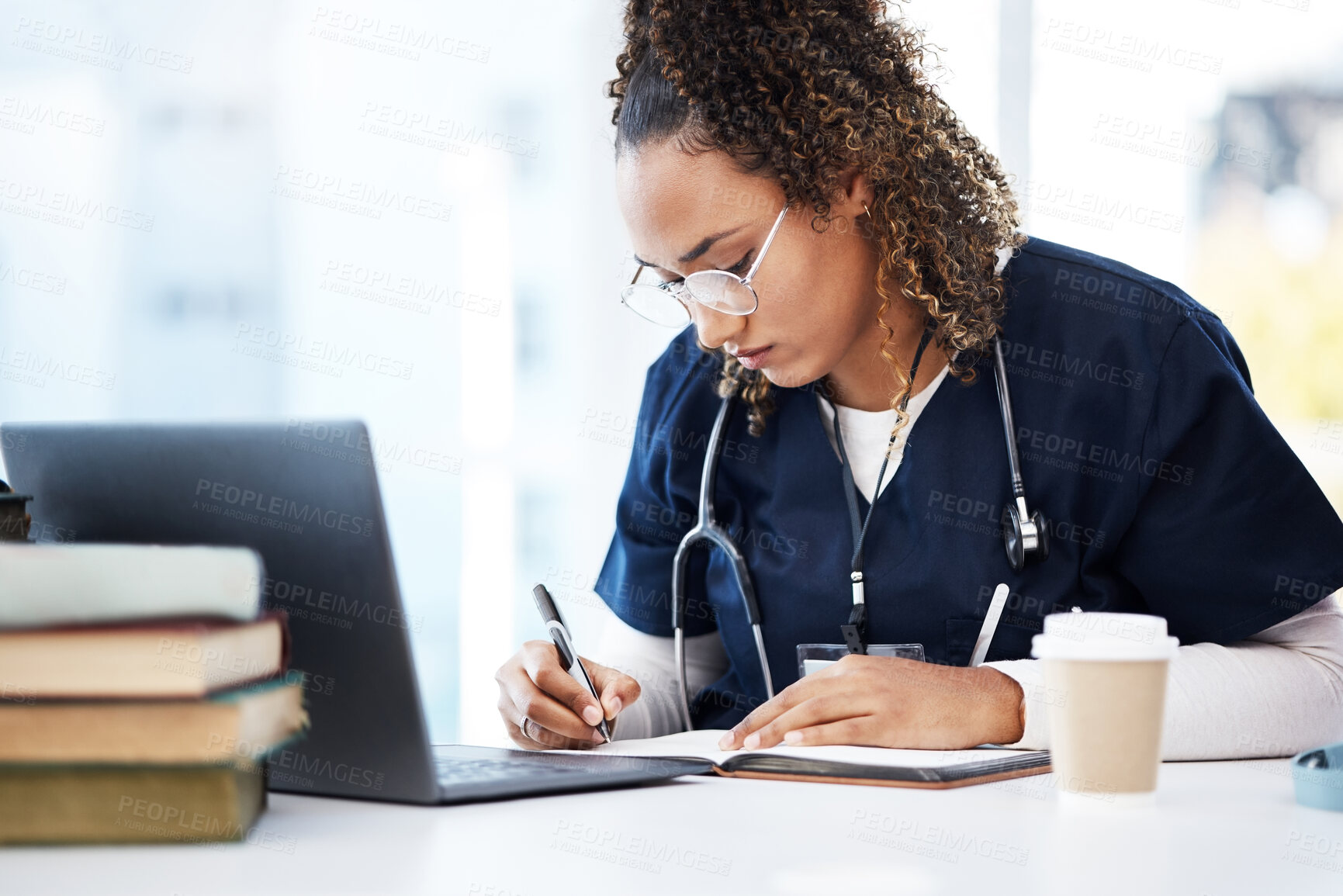 Buy stock photo Medical student, thinking or writing books in research education, wellness studying or hospital learning. Laptop, nurse or healthcare woman and notebook, technology or scholarship medicine internship