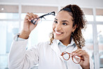 Eye care, vision and black woman, glasses choice and optometrist, healthcare for eyes with doctor and smile. Prescription lens, designer frame and eyewear decision, health insurance and optometry