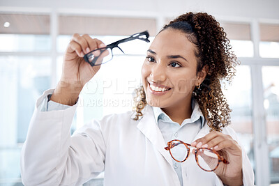 Buy stock photo Eye care, vision and black woman, glasses choice and optometrist, healthcare for eyes with doctor and smile. Prescription lens, designer frame and eyewear decision, health insurance and optometry