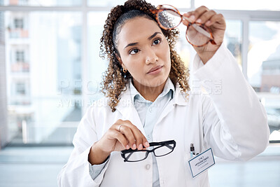 Buy stock photo Glasses, vision and black woman eye doctor check lens and frame for healthcare and optometry. Medical ophthalmology worker person in clinic or hospital for test, exam and care for eyes for wellness