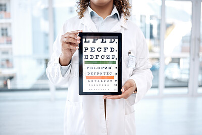 Buy stock photo Hands, optometry chart and tablet screen in hospital for vision examination in clinic. Healthcare, snellen or woman, ophthalmologist or medical doctor holding technology showing letters for eye test.