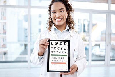 Buy stock photo Portrait, eye chart and doctor with tablet in hospital for vision examination in clinic. Healthcare, snellen and medical ophthalmologist or woman holding technology with text or letters for eyes test