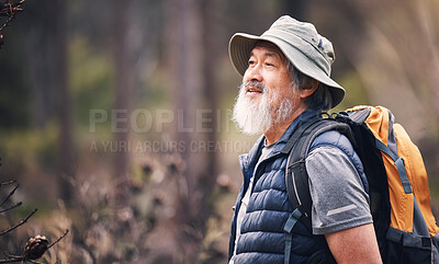 Buy stock photo Senior man, hiking and forest with backpack for travel, adventure or camping journey in nature. Elderly male hiker with smile for natural environment, traveling or backpacking and trekking outdoors

