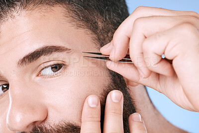 Buy stock photo Aesthetic, beauty and hair removal with eyebrow of man and tweezers for grooming, skincare and maintenance. Hygiene, cosmetics and self care with face of model shaping growth for treatment and facial