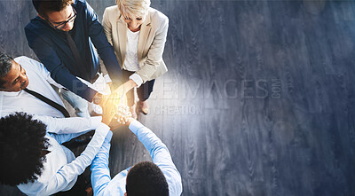Buy stock photo Business people, team and hands together above on mockup for unity, trust or collaboration at office. Group of corporate workers piling hand for teamwork, agreement or community goals in solidarity