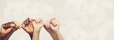 Buy stock photo Hands, friends and holding hands with diversity and trust, pinky promise and mockup space on studio background. Team, support and solidarity with bokeh overlay, winning and people with connection