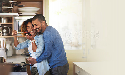 Buy stock photo Cooking, black couple and hug in a kitchen with marriage and love at home with mockup. Dinner, food taste and happy woman and man together with care in a house with mock up and happiness from eating 